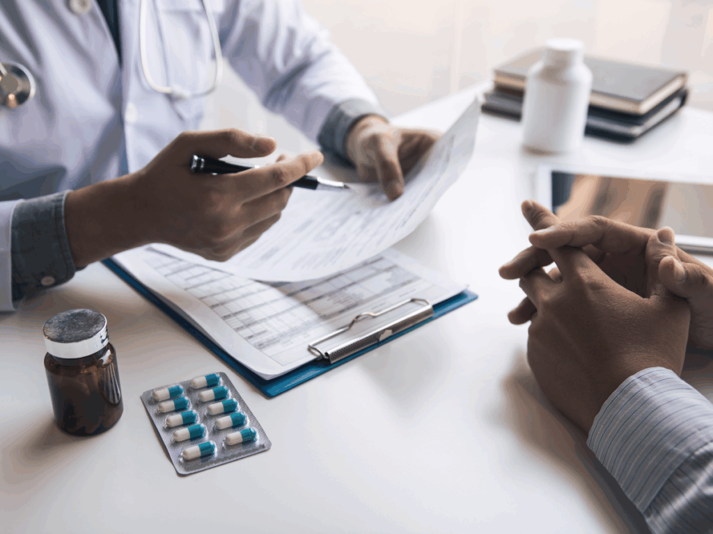 Medical professional discussing patient's dual diagnosis of addiction and mental health issues