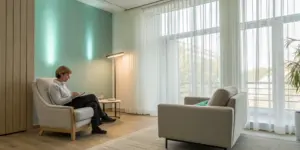 A person receiving EMDR therapy for addiction recovery in a calm office setting.